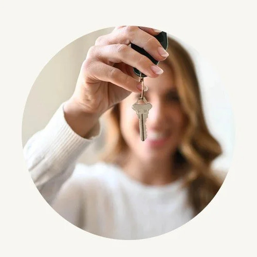 Relocation buyer holding house keys